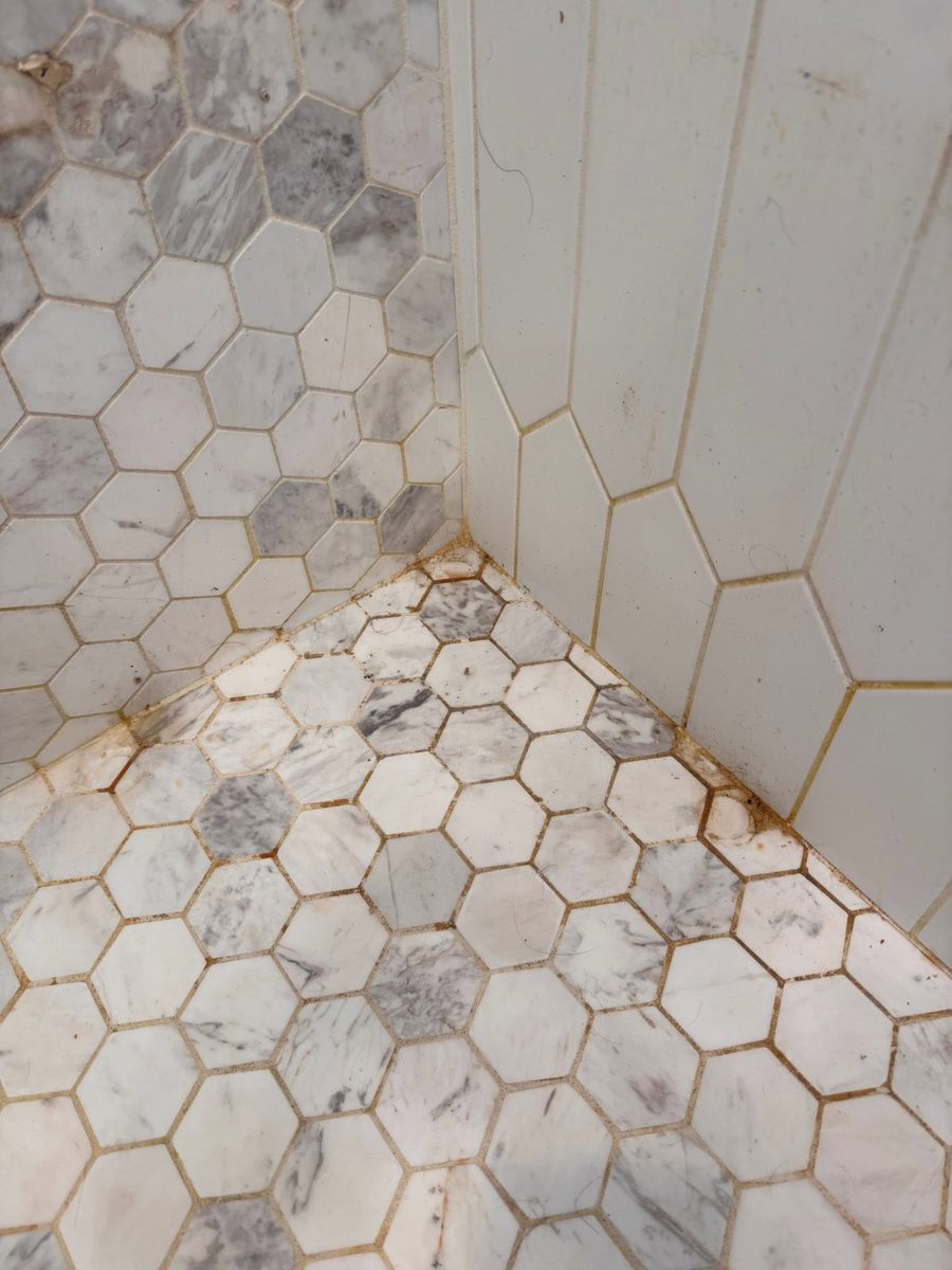 Shower tile and grout before Tidy Sparkles cleaning